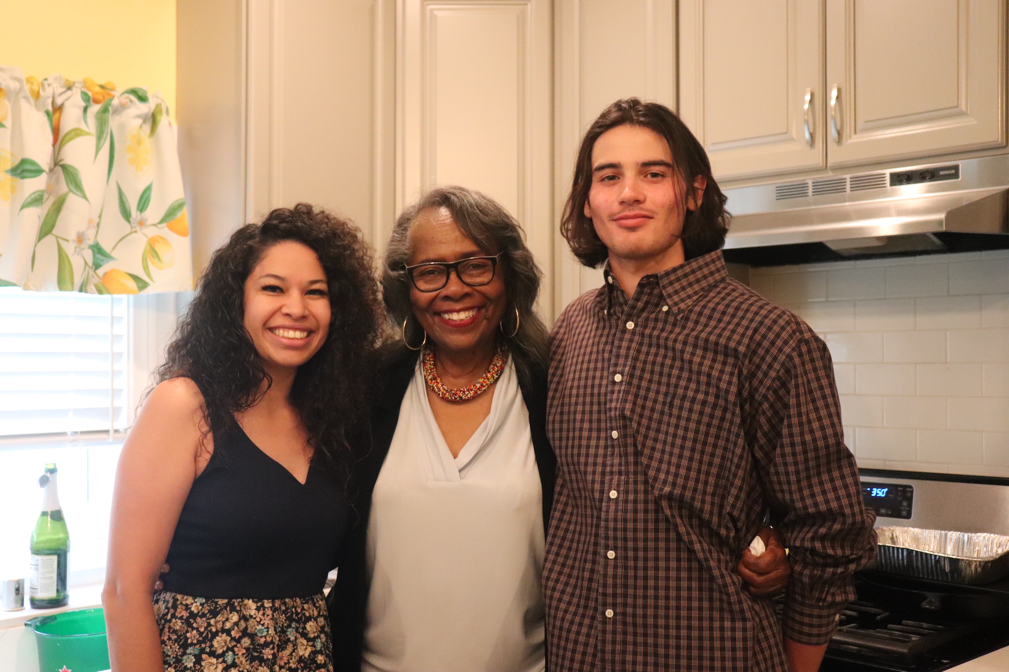 Biddy Mason Charitable Foundation CEO and President Jackie Broxton standing with two scholarship recipients and former foster youths